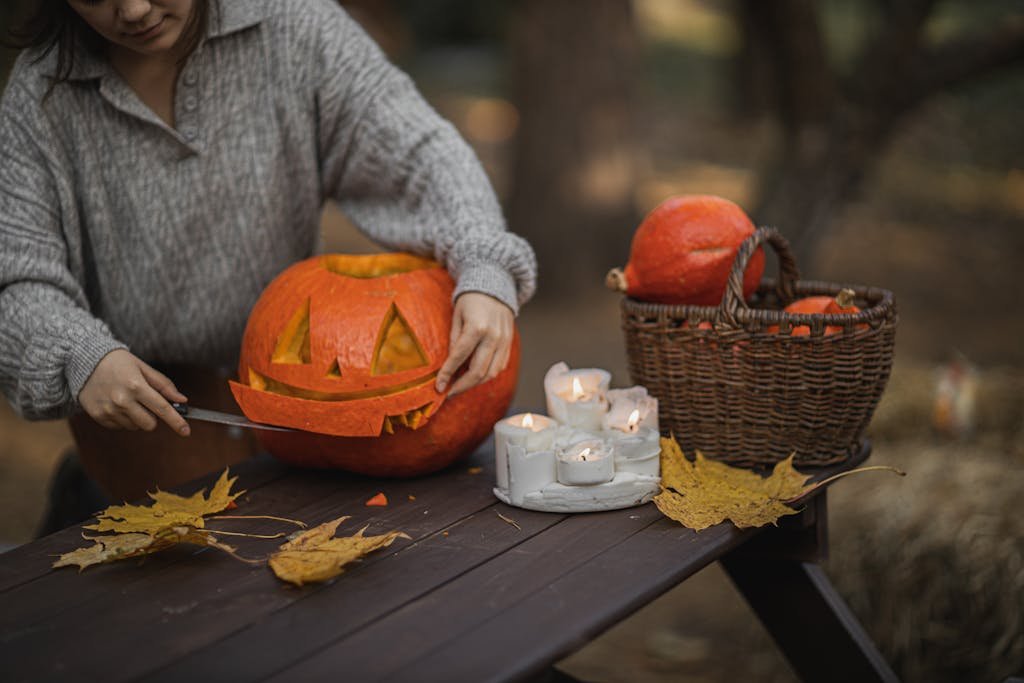 Woman Carving A Pumpkin-fall bucket list